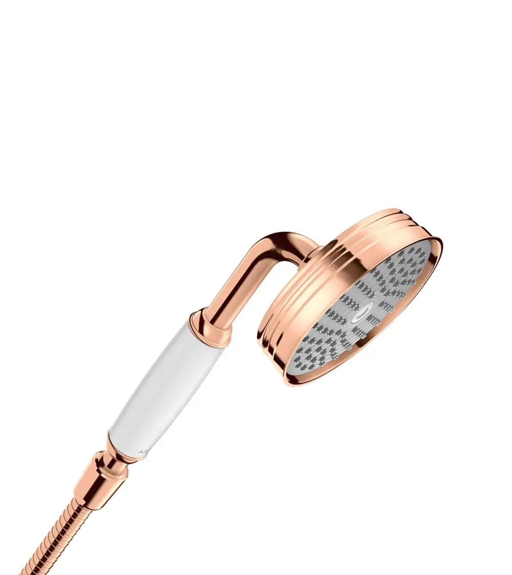 Handbrause mit runder Kopfpartie und einem gebogenen Griff in Polished Red Gold von AXOR. Die Oberfläche hat ein geometrisches Muster auf dem Duschkopf.